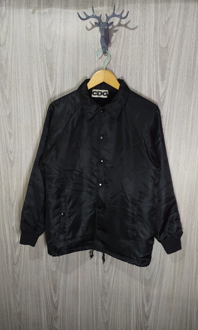 Comme des Garçons Coach Jacket (Category: Coats, Jackets and Outerwear) located in Naga. Submitted by secondspinv2 (Listing ID 1455363495, Image 2). Description: Comme des Garçons Coach Jacket ✅Size: S ✅Width: 21 ✅Length: 27 ✅Color Rate: 9.5/10 ✅No Issue ✅Need Wash ✅Location: Bicol Naga City, Camarines Sur ✅Courier: J&T Express/Flash Express ✅MOP: Gcash only.