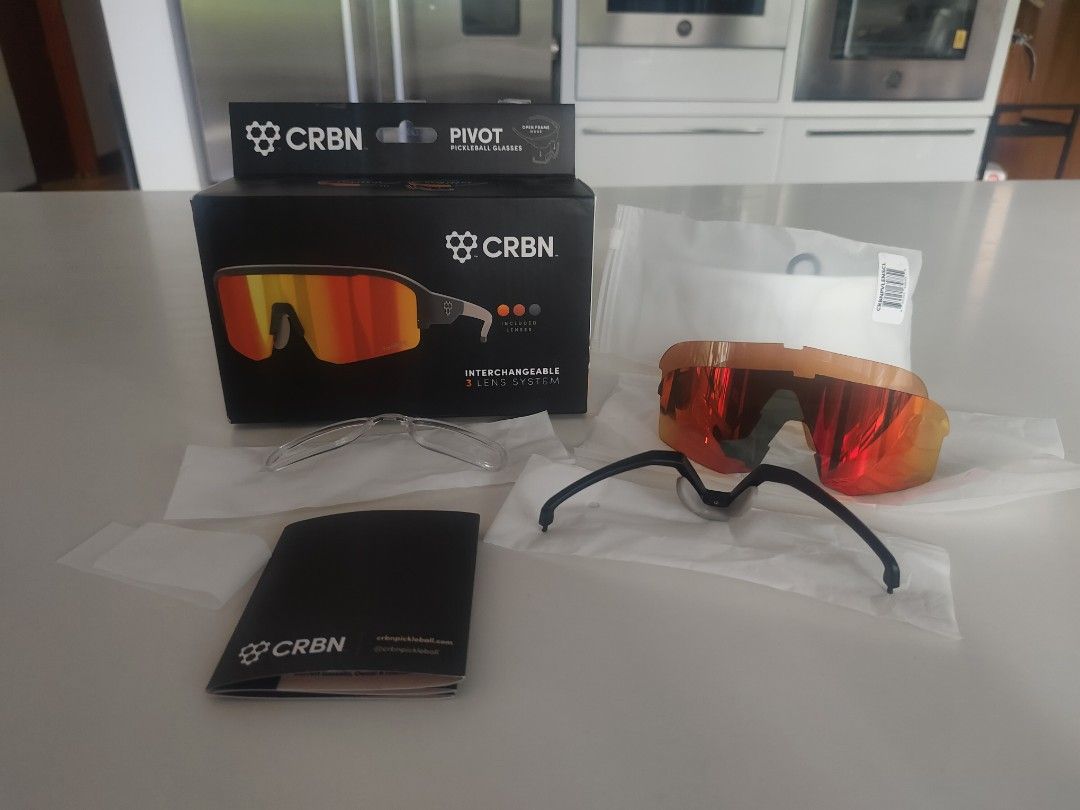 CRBN Pivot Pickleball Sunglasses Interchangeable Lens System (Category: Sunglasses & Eyewear) located in Muntinlupa City. Submitted by cezzy82 (Listing ID 1455367101, Image 1). Description: - CRBN Pivot pickleball sunglasses - Comes with original box and all accessories - Includes interchangeable lenses for various light conditions - Designed for optimal pickleball play - Ensures clear vision on the court.