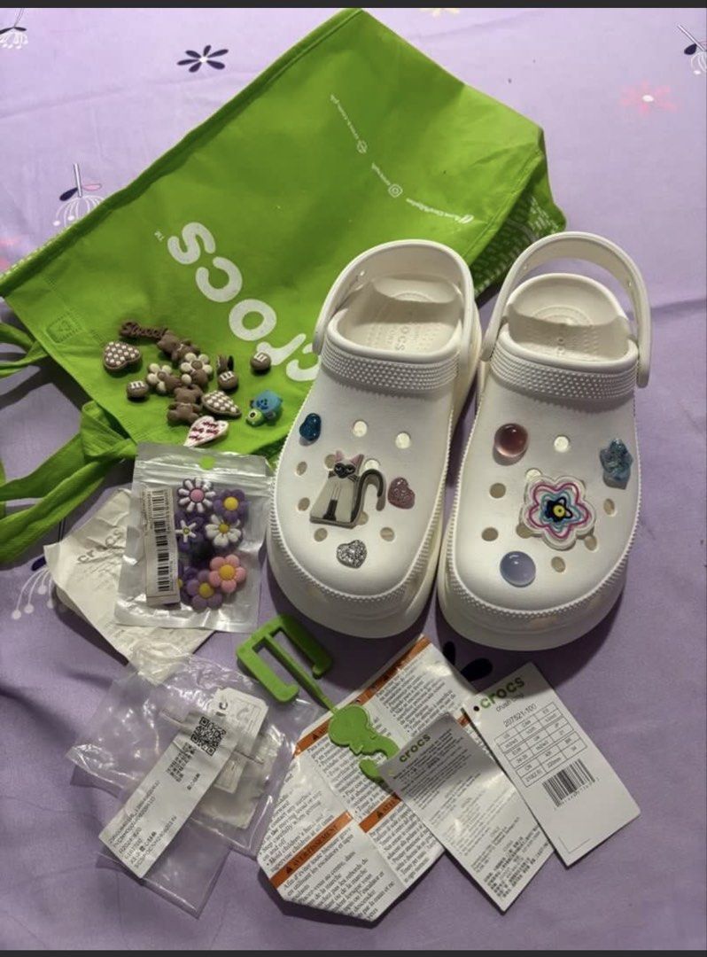 Crocs Crush Clog Platform White with Charms (Category: Slippers and slides) located in Orani. Submitted by cathsclothing (Listing ID 1455372181, Image 3). Description: Php 4,495 mall price - White platform Crocs - Size: 35-36 EU / 210mm - Includes M&M and other cute charms from Shein - Comes with original Crocs bag and receipt - Recently purchased - Selling because it's not my style - Grab these fun clogs!.