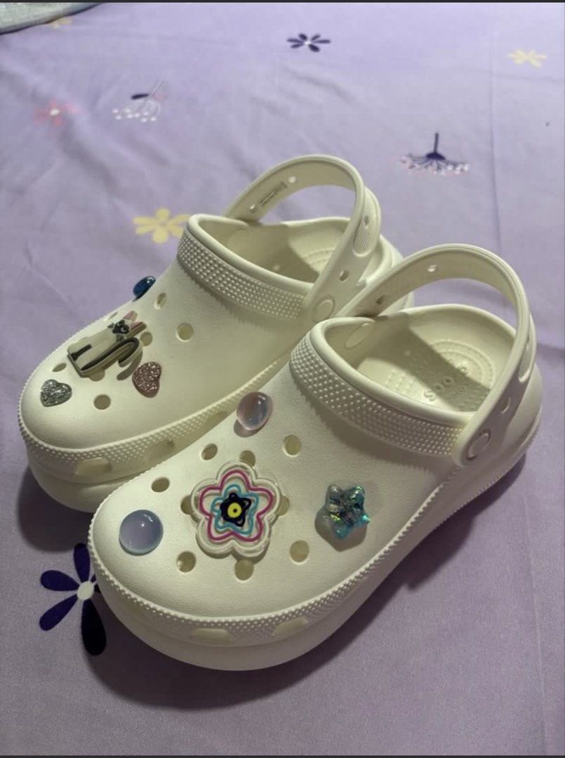 Crocs Crush Clog Platform White with Charms (Category: Slippers and slides) located in Orani. Submitted by cathsclothing (Listing ID 1455372181, Image 2). Description: Php 4,495 mall price - White platform Crocs - Size: 35-36 EU / 210mm - Includes M&M and other cute charms from Shein - Comes with original Crocs bag and receipt - Recently purchased - Selling because it's not my style - Grab these fun clogs!.