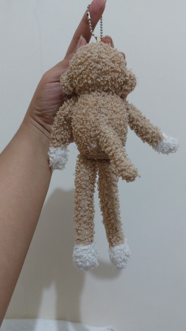 Cute Fluffy Monkey Plush Toy Keychain (Category: Plushies & Soft Toys) located in Mandaluyong City. Submitted by 13thsilverrabbit (Listing ID 1455490672, Image 2). Description: - Adorable fluffy bunny plush toy - Comes with a keychain attachment - Has a small tag with the number '20' - Ideal for decorating bags or as a small gift - Very soft and cuddly texture.