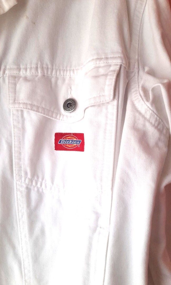 Dickies USA White Denim Jacket Size S (Category: Coats, Jackets and Outerwear) located in Manila. Submitted by sec0ndbloom (Listing ID 1455357306, Image 2). Description: - Brand: Dickies USA - Style: White Denim Jacket - Size: S - Features: Classic Dickies logo on back, chest pockets, button closure - Ideal for: Casual wear - minor closet stains.