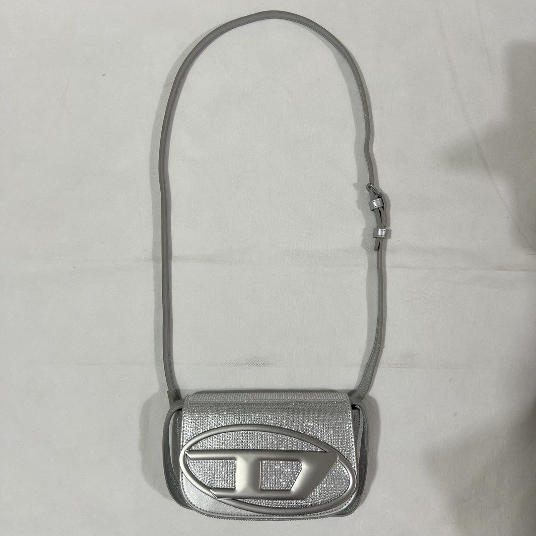 Diesel Silver Rhinestone Shoulder Bag with Logo (Category: Shoulder Bags) located in Cavite. Submitted by itsayaaa (Listing ID 1455469355, Image 3). Description: Y2K Diesel Rhinestones Bag Issue: No issue Condition: Excellent Condition STARTING BID: 150 INCREMENT: 50 CLAIM: 📥.