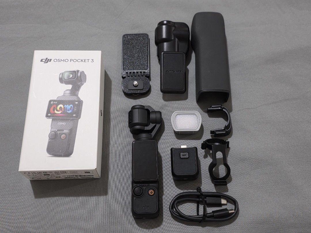 DJI Osmo Pocket 3 Standard (Category: Cameras) located in Paranaque City. Submitted by k3ndyj (Listing ID 1455490087, Image 1). Description: - DJI Osmo Pocket 3 Standard Bundle - Perfect for vlogging and travel - Includes: Camera, Protective Case, Charging Cable, LED Light with 2 Mounts, Magnetic Mount - Well used please expect a few small dents and scratches - Works perfectly fine - Never had issues with the rotating screen - NO memory card incl