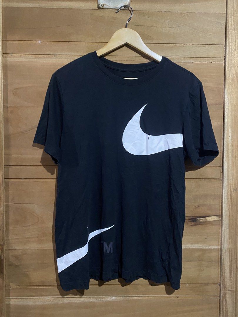 Double shwoosh TM shirt (Category: Tshirts & Polo Shirts ) located in Manila. Submitted by sixbysix (Listing ID 1455474011, Image 1). Description: Dimes 23.5x26 Condition 9/10 Color rate 10/10 Issue check on last pic but still goods .