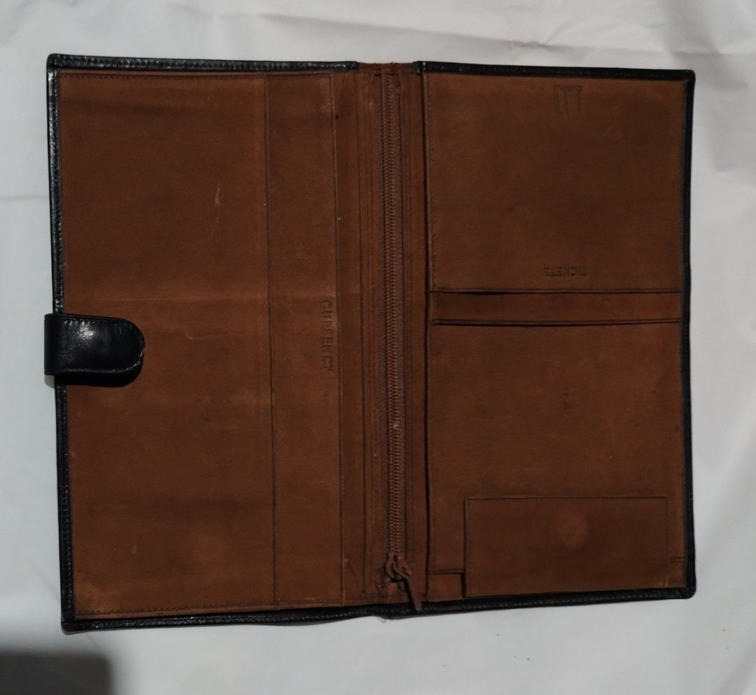 Dunhill wallet vintage (Category: Luxury Bags & Wallets) located in Manila. Submitted by rockandrolly (Listing ID 1455496248, Image 2). Description: Title: Authentic Alfred Dunhill Vintage Leather Travel Organizer / Long Wallet ✅ Details - Brand: Alfred Dunhill — iconic British luxury brand ​ - Material: Premium full-grain leather (black exterior, tan interior) ​ - Features: Snap button closure, currency slots, ticket pockets, zip compartment, do