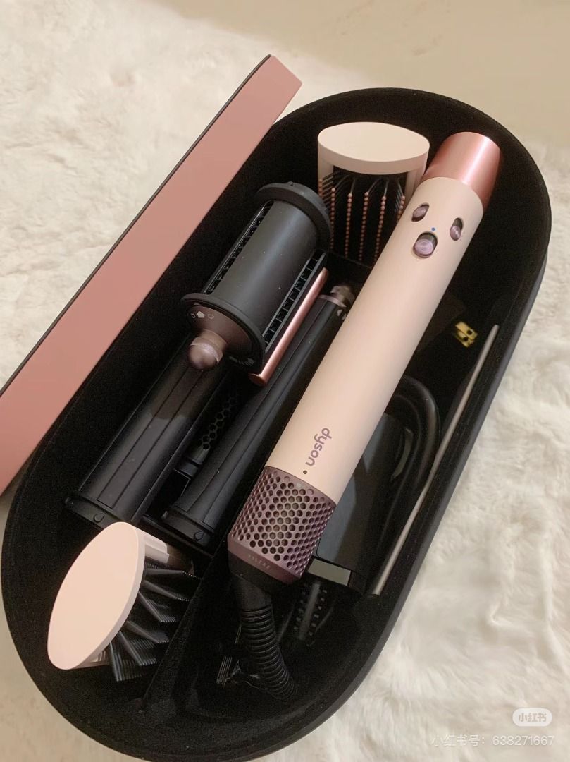 Dyson Airwrap Complete Long - Rose Gold (Category: Hair) located in Pateros City. Submitted by nisfarxald25135 (Listing ID 1455383291, Image 1). Description: - Dyson Airwrap Complete Long in elegant Rose Gold. - Comes with multiple barrels and brushes for versatile styling. - Includes original storage case to keep attachments organized. - Achieve curls, waves, and smooth, sleek hair effortlessly..
