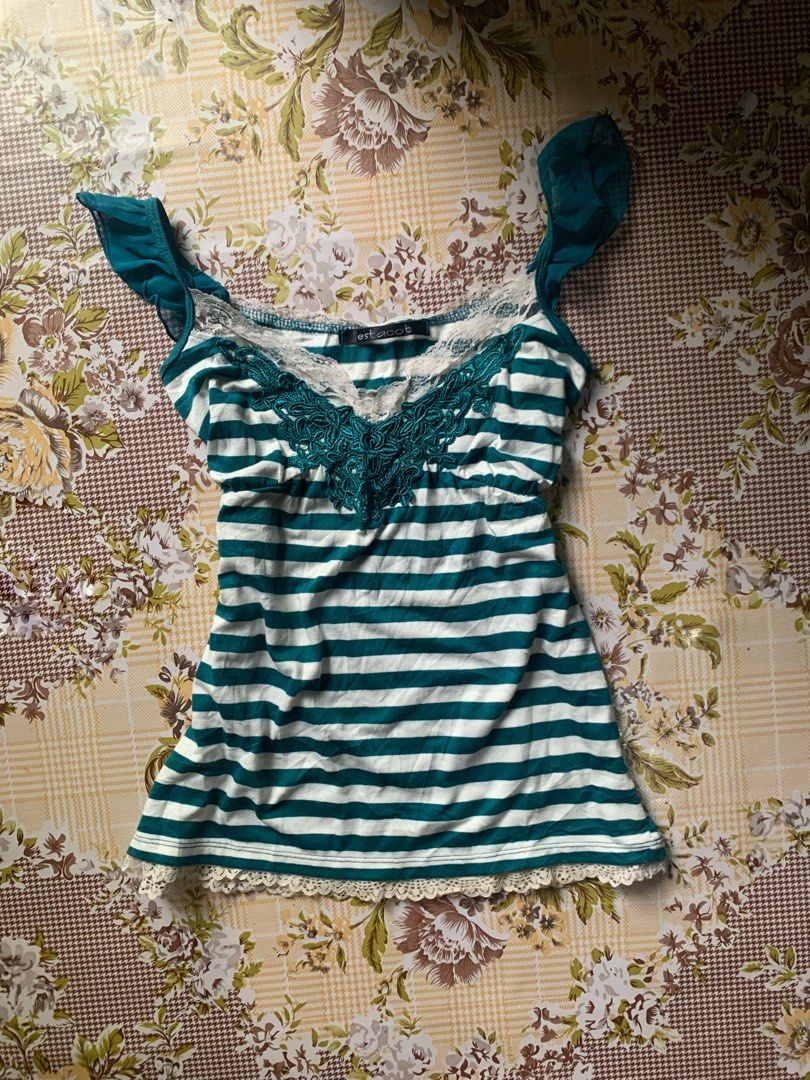 Estacot Striped Tank Top with Lace (Category: Sleeveless) located in Cebu City. Submitted by selamethrift (Listing ID 1455396780, Image 1). Description: - Green and white striped tank top - Features lace trim along the neckline and hem - Pretty embroidered detail on the chest - Ruffled straps for a feminine touch .