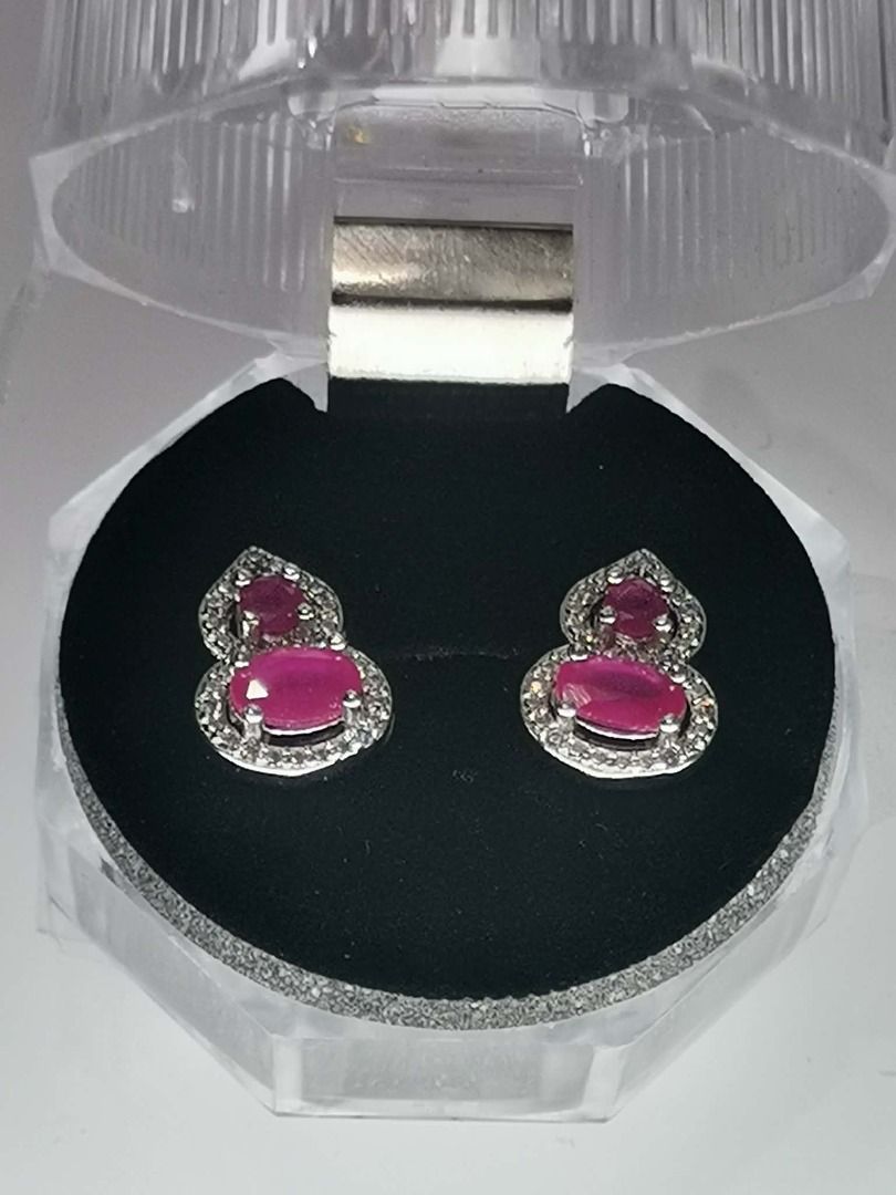 F8RE325 FIGURE-8 RUBY EARRING (Category: Earrings) located in Cavite. Submitted by falconsclawset (Listing ID 1455440358, Image 1). Description: - Beautiful oval-cut ruby and zirconia earrings. - Set in stainless steel. - Features an intricate and eye-catching design. - Adds a vibrant pop of color to any outfit. - Comes with a clear display case..