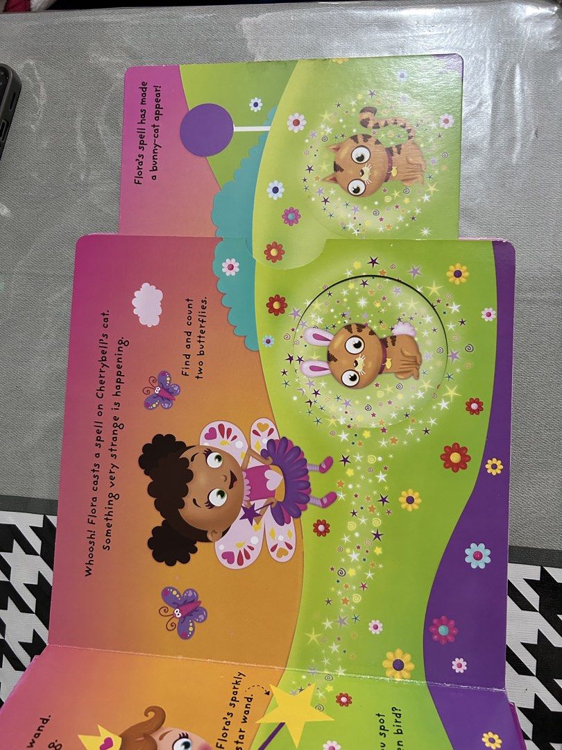Fairy Magic Interactive Board Book – Shapes, Colours & Numbers (Category: Children's Books) located in Manila. Submitted by truewind.e362a9 (Listing ID 1455496892, Image 3). Description: Book Title: Fairy Magic Educational Themes: Shapes, Colours, and Numbers Interactive Elements: Push, pull, turn, and lift-the-flap features Shaped die-cut window on the cover for interactive visual fun Format: Sturdy Board Book / Hardcover (designed to withstand 