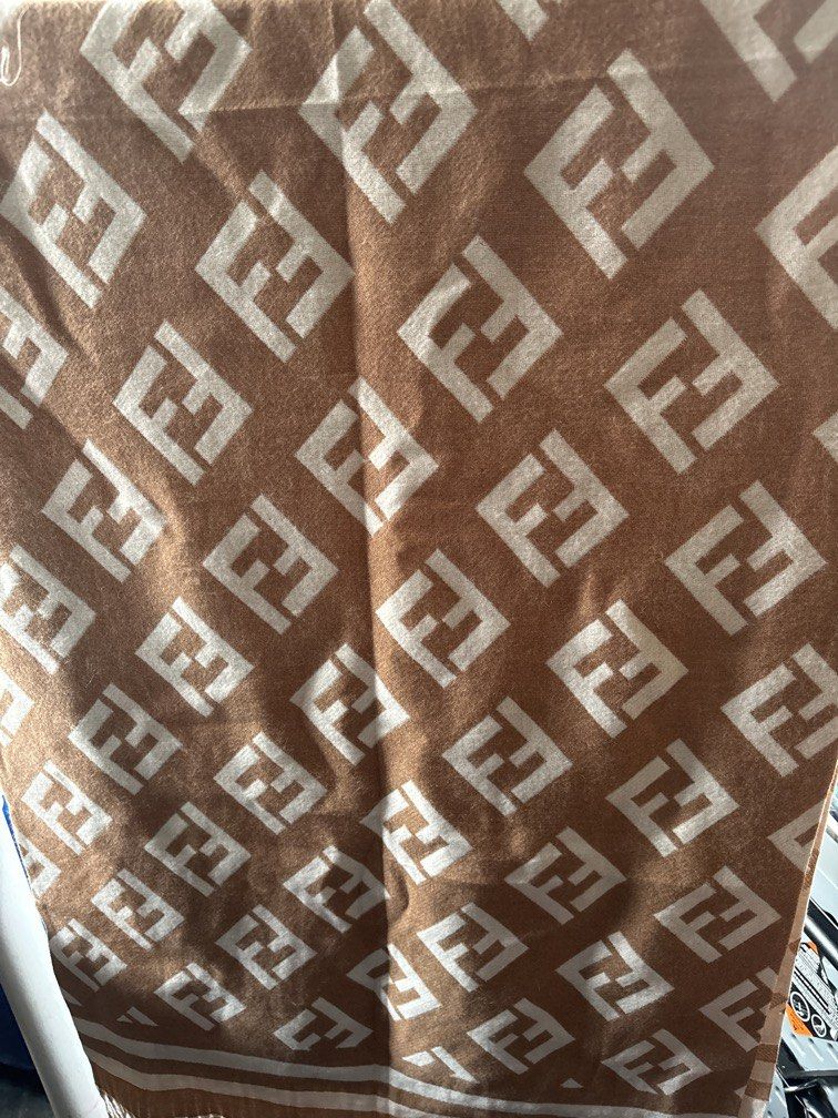 Fendi Scarf (Category: Coats, Jackets and Outerwear) located in Baguio. Submitted by brix6699 (Listing ID 1455343459, Image 3). Description: FENDI SCARF 70 inches length 25 inches width .