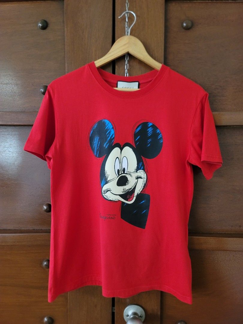 FIXED PRICE! Preloved Mickey Shirt G/ uccI (see description) (Category: Luxury Apparel) located in Quezon City. Submitted by justdeclutter_ (Listing ID 1455468599, Image 2). Description: M on tag, good condition Cotton fabric Pls self authntic8 With wash tags Issue: very minimal tastas, see last photo Bawal po sa maarte armpit to armpit - 19 inches shoulder - 18 inches length - 25 inches 🔷PLEASE READ: Items are preloved and in good quality unles