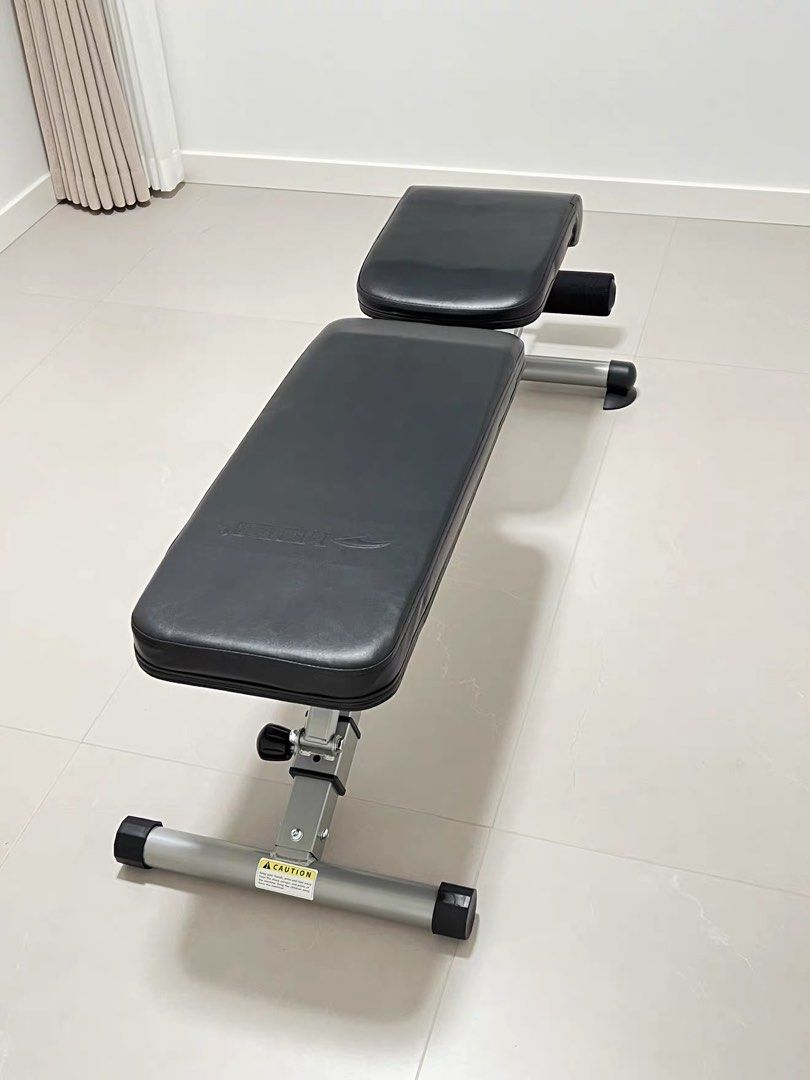 foldable exercise bench (Category: Weights & Dumbbells) located in Singapore. Submitted by jioz2809 (Listing ID 1455445845, Image 1). Description: - Adjustable backrest and seat angles - Integrated leg rollers for extra exercises - Solid construction, ideal for home training - Ready for your next workout session self pick up from Dakota.