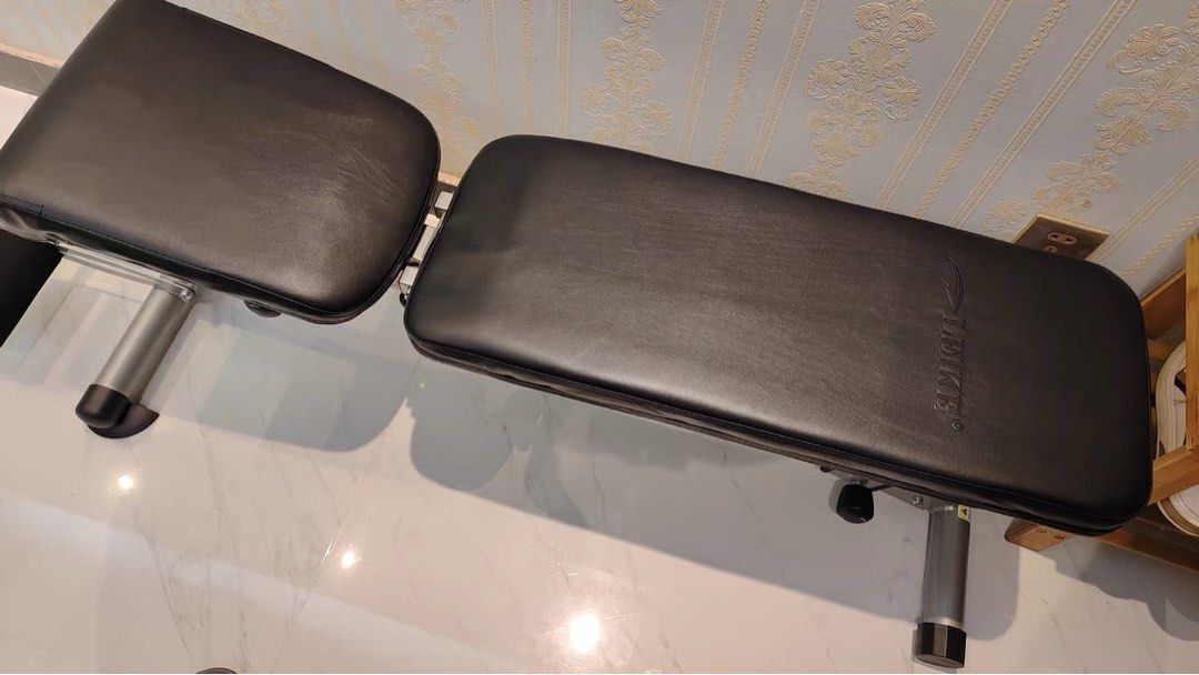 foldable exercise bench (Category: Weights & Dumbbells) located in Singapore. Submitted by jioz2809 (Listing ID 1455445845, Image 3). Description: - Adjustable backrest and seat angles - Integrated leg rollers for extra exercises - Solid construction, ideal for home training - Ready for your next workout session self pick up from Dakota.