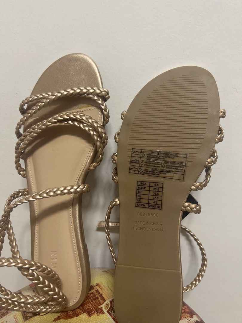 Forever 21 Gold Braided Lace-Up Flat Sandals (Category: Flats & Sandals) located in Makati City. Submitted by lilfinds (Listing ID 1455422741, Image 1). Description: Forever 21 Rose Gold Braided Strappy Sandals – Size 6.5 ₱500– Negotiable Brand new / never worn Forever 21 braided strappy flat sandals in a beautiful rose gold metallic color. ✨ * Forever 21 * Size: US 6.5 / EU 37.5 / 23.5 cm * Rose gold metallic * Braided multi-strap design * Ankle