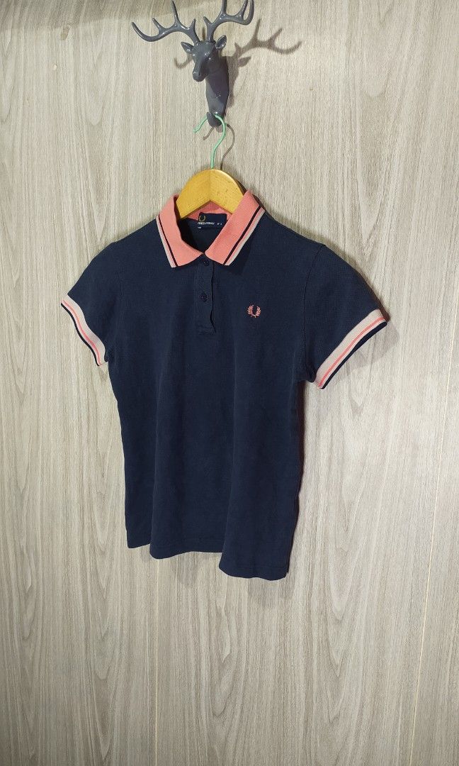 Fred Perry Navy Blue Polo Shirt (Category: Others Tops) located in Naga. Submitted by secondspinv2 (Listing ID 1455359714, Image 2). Description: Fred Perry Navy Blue Polo Shirt ✅Size: S ✅Width: 17 ✅Length: 20 ✅Color Rate: 9.5/10 ✅No Issue ✅Need Wash ✅Location: Bicol Naga City, Camarines Sur ✅Courier: J&T Express/Flash Express ✅MOP: Gcash only.