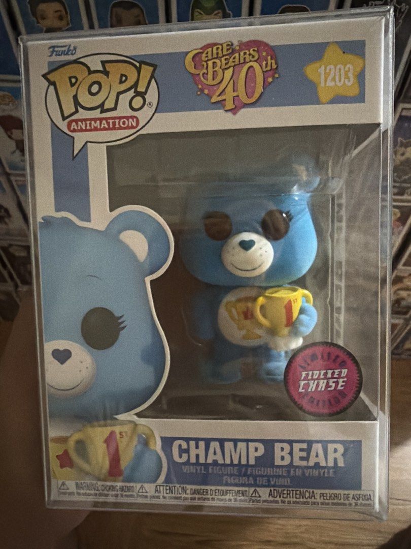 Funko Pop! Care Bears Champ Bear Flocked Chase #1203 (Category: Designer & Blind Box Toys) located in Taguig. Submitted by migsonpops (Listing ID 1455403635, Image 1). Description: 📦 Includes a used protector 📸 PM me for additional photos. 🚚 Shipping via Lalamove or LBC (shipping fee to be shouldered by the buyer). 💳 Payment via GCash. 📍 Meetup or pickup: Taguig City.