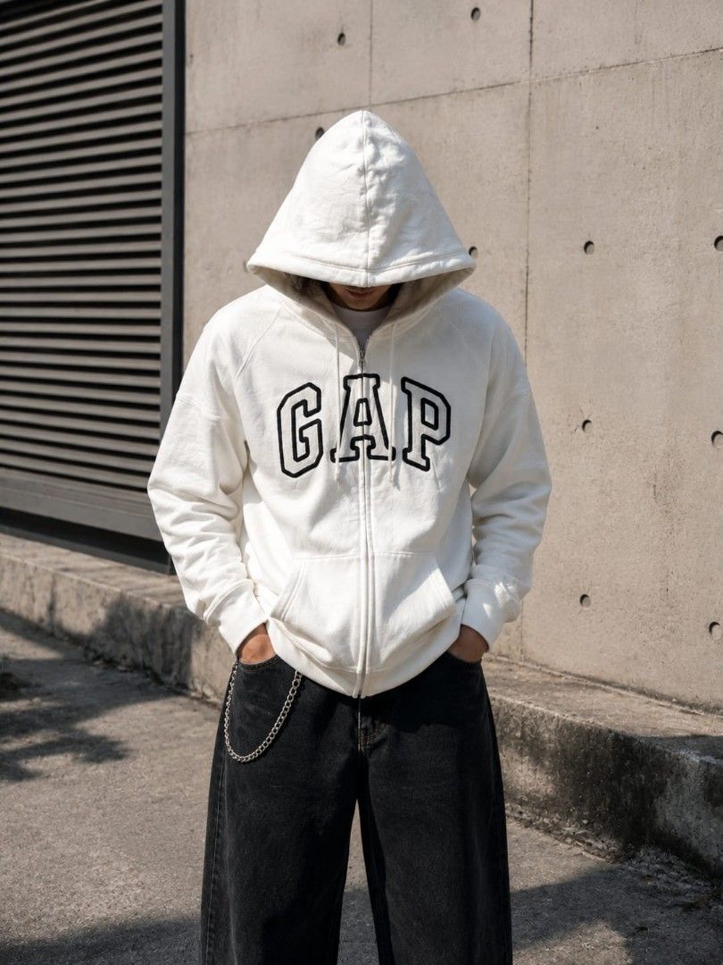 GAP WHITE HOODIE original Imbroidered logo (Category: Hoodies) located in Alburquerque. Submitted by bossgabgallery (Listing ID 1455470231, Image 3). Description: CLASSIC GAP ZIP-UP HOODIE 🔥 Timeless comfort meets everyday style. Grab this classic white Gap hoodie before it's gone! ⚡ PRODUCT DETAILS Brand: GAP Style: Full Zip-Up Hoodie Color: White / Cream Size: W: 20" x L: 24.5 Inch (MEDIUM to LARGE) ⚡ CONDITION & QUALITY Condition: Very Good C