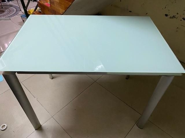 Glass Top Dining Table with Metal Legs (Category: Tables & Sets) located in Pasay City. Submitted by vietnamrose1972 (Listing ID 1455450318, Image 1). Description: EXPANDABLE Glass top table - once used for a print ad shoot ... glass top has NO scratches , legs have some minimal scratches but unrecognizable..... bought at IDEA glorietta php 24,000.00..... table top size 25.5 x 39.5 but can be expanded to 25.5 x 55 inches......