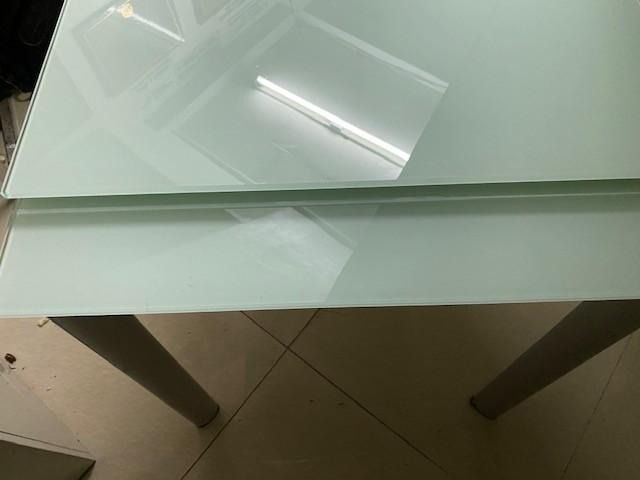 Glass Top Dining Table with Metal Legs (Category: Tables & Sets) located in Pasay City. Submitted by vietnamrose1972 (Listing ID 1455450318, Image 3). Description: EXPANDABLE Glass top table - once used for a print ad shoot ... glass top has NO scratches , legs have some minimal scratches but unrecognizable..... bought at IDEA glorietta php 24,000.00..... table top size 25.5 x 39.5 but can be expanded to 25.5 x 55 inches......