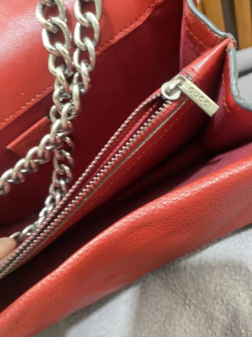Gucci Red Leather Dionysus Chain Bag (Category: Luxury Bags & Wallets) located in Zamboanga. Submitted by smartstyle (Listing ID 1455334936, Image 3). Description: - Authentic Red Gucci Dionysus Bag - Material: Pebbled Leather - Signature Tiger Head Closure with Red Crystal Details - Silver-Tone Chain Strap - Multiple Interior Compartments - Interior Zip Pocket - Visible Serial Number - Perfect Statement Piece.