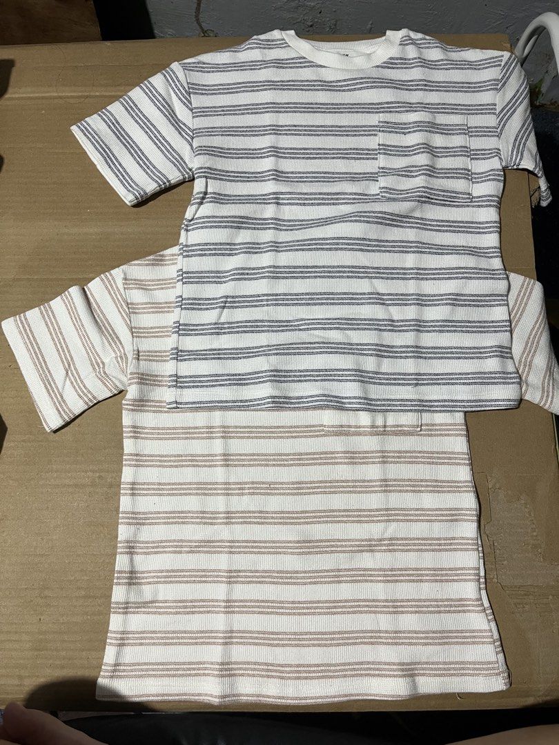 H&M 4 T-shirts BUNDLE! WITH FREEBIE Sando (Category: Babies & Kids Fashion) located in Manila. Submitted by hi_abbd (Listing ID 1455477168, Image 1). Description: - Bundle of 4 H&M t-shirts for boys - Includes 2 striped t-shirts (white with blue stripes and pocket, off-white with brown stripes) - Also includes 2 graphic t-shirts (one with dinosaurs and sequins, one with a skeleton graphic) - All are short-sleeved with crew necks - Perfect for cas