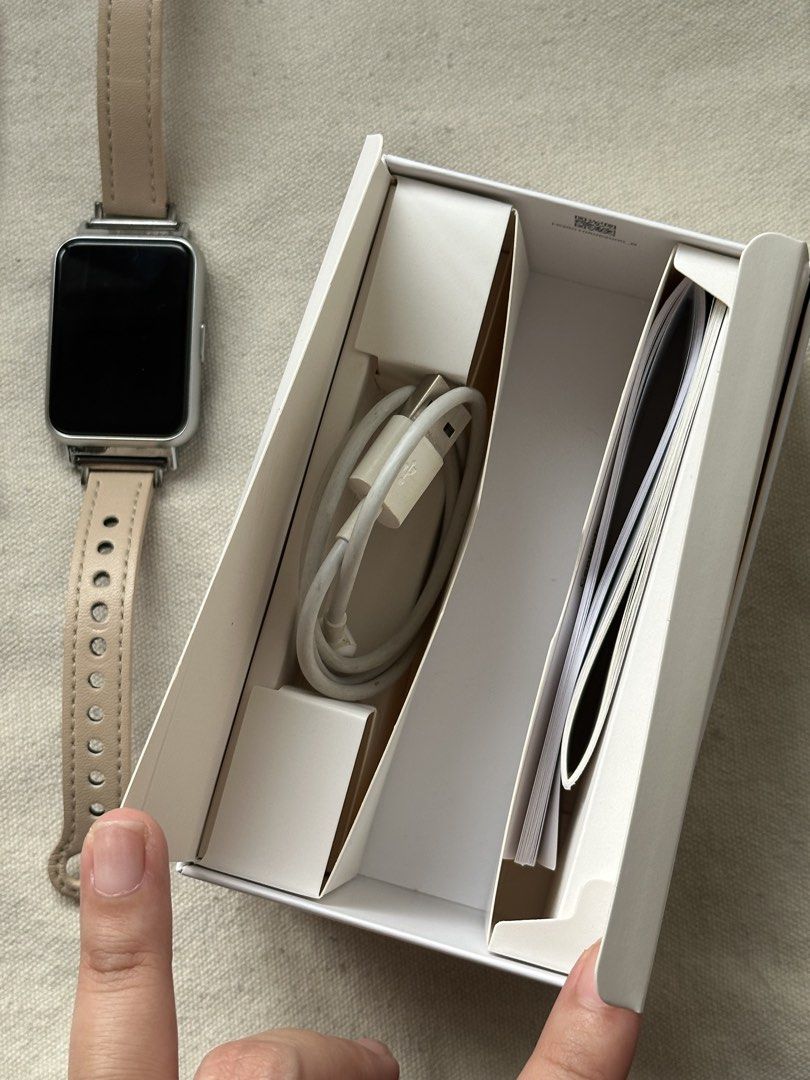 Huawei Fit 2 with 2 extra straps (Category: Wearables & Smart Watches) located in Quezon City. Submitted by __kayela (Listing ID 1455406943, Image 3). Description: - well-used Huawei Fit 2 - comes with the original blue silicone strap but with flaw (please see pic) - with 2 extra straps (leather and silicone; in pic) - no issues with the watch itself - negotiable for sure buyers!.