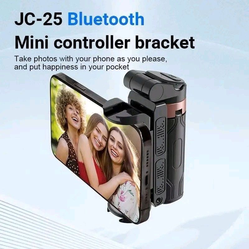 JC-25 Bluetooth Mini Controller Bracket Tripod (Category: Tripods & Monopods) located in Manila. Submitted by marvieobordo (Listing ID 1455368922, Image 3). Description: - JC-25 Bluetooth Mini Controller Bracket - Functions as an extension tripod and desktop phone stand - Removable embedded remote control for easy photo-taking - Palm-sized and lightweight (116g) - Pocket-friendly for easy carrying - Ideal for vlogging and group photos.
