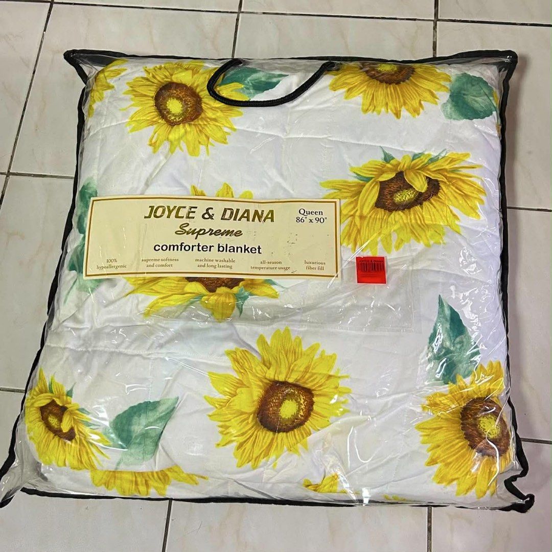 Joyce & Diana Supreme Comforter Blanket Queen (Category: Bedding & Towels) located in Manila. Submitted by essentialattributes (Listing ID 1455329547, Image 3). Description: - Queen Size Comforter Blanket (86" x 90") - Brand: Joyce & Diana Supreme - 100% Hypoallergenic Material - Supreme Softness and Comfort - Luxurious Fiber Fill for All-Season Temperature - Machine Washable - Long-Lasting Quality - Comes in a Reusable Bag.