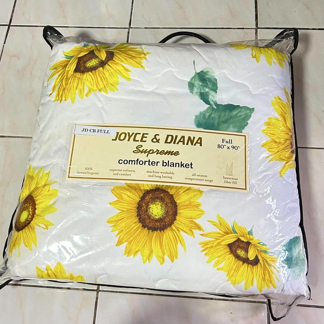 Joyce & Diana Supreme Comforter Blanket Queen (Category: Bedding & Towels) located in Manila. Submitted by essentialattributes (Listing ID 1455329547, Image 2). Description: - Queen Size Comforter Blanket (86" x 90") - Brand: Joyce & Diana Supreme - 100% Hypoallergenic Material - Supreme Softness and Comfort - Luxurious Fiber Fill for All-Season Temperature - Machine Washable - Long-Lasting Quality - Comes in a Reusable Bag.