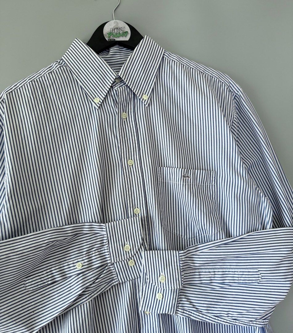Lacoste stripe (Category: Formal Shirts) located in Cebu City. Submitted by bestpicked (Listing ID 1455407176, Image 3). Description: Authentic Excellent condition Size 40 on tag Dimension 23x28-30 inches Best fit large No issue Location- Cebu City We ship nationwide Mod payment - Bank transfer/Gcash.