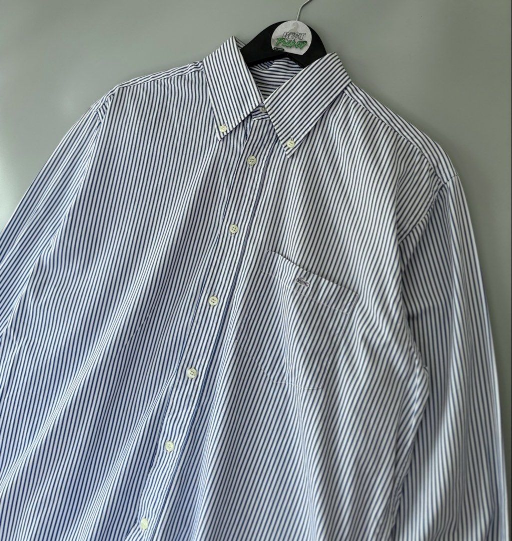 Lacoste stripe (Category: Formal Shirts) located in Cebu City. Submitted by bestpicked (Listing ID 1455407176, Image 2). Description: Authentic Excellent condition Size 40 on tag Dimension 23x28-30 inches Best fit large No issue Location- Cebu City We ship nationwide Mod payment - Bank transfer/Gcash.