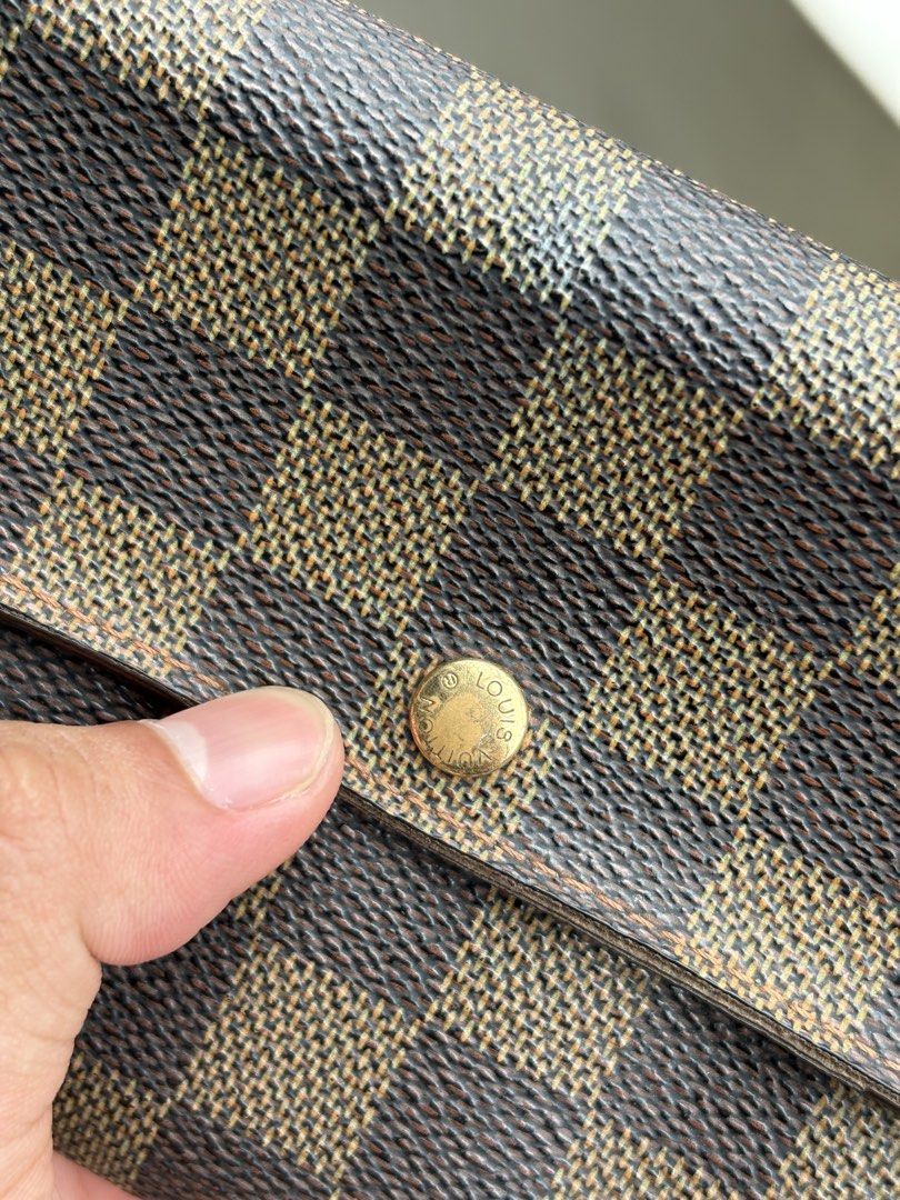 LOUIS VUITTON DAMIER EBENE SARAH LONG WALLET (Category: Luxury Bags & Wallets) located in Naga. Submitted by sislovesme (Listing ID 1455345819, Image 2). Description: •RANK AB •MINOR SIGN OF USAGE ChECK PICS •AUTHENTIC .