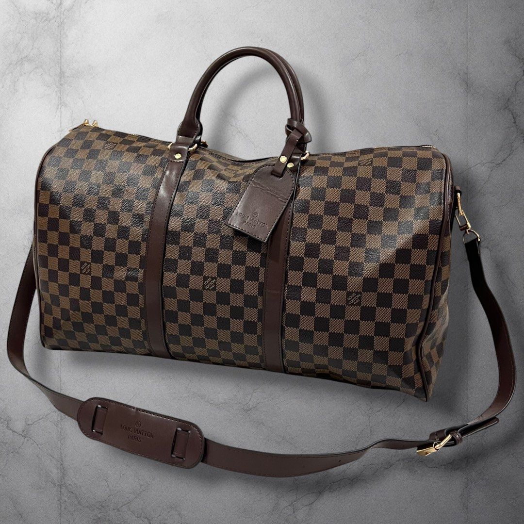 Louis Vuitton Keepall 55 Damier Ebene (Category: Luxury Bags & Wallets) located in Cavite. Submitted by itsayaaa (Listing ID 1455469353, Image 1). Description: Louis Vuitton Keepall Bandoulière travel duffel Issue: No issue Condition: Excellent Condition STARTING BID: 150 INCREMENT: 50 CLAIM: 📥.