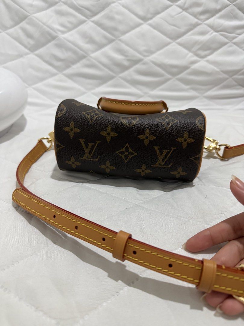 Louis Vuitton monogram mini speedy (dustbag only) (Category: Luxury Bags & Wallets) located in Morong. Submitted by baemuzy (Listing ID 1455499240, Image 3). Description: - Classic Monogram Canvas - Vachetta Leather Trim - Gold Hardware - Used once - Detachable Shoulder Strap Included.