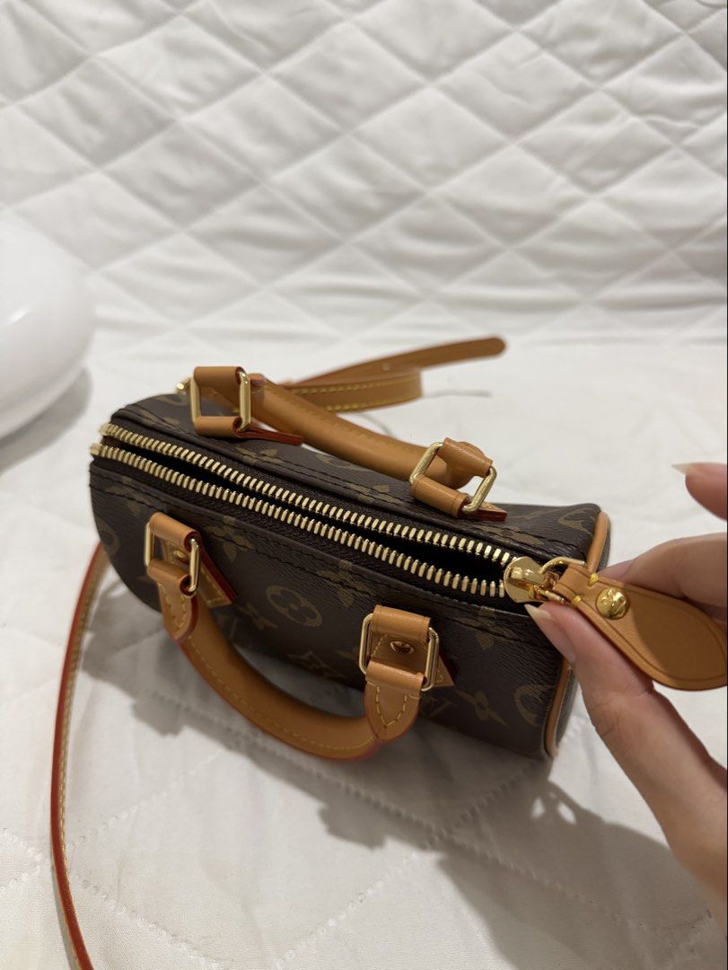 Louis Vuitton monogram mini speedy (dustbag only) (Category: Luxury Bags & Wallets) located in Morong. Submitted by baemuzy (Listing ID 1455499240, Image 1). Description: - Classic Monogram Canvas - Vachetta Leather Trim - Gold Hardware - Used once - Detachable Shoulder Strap Included.