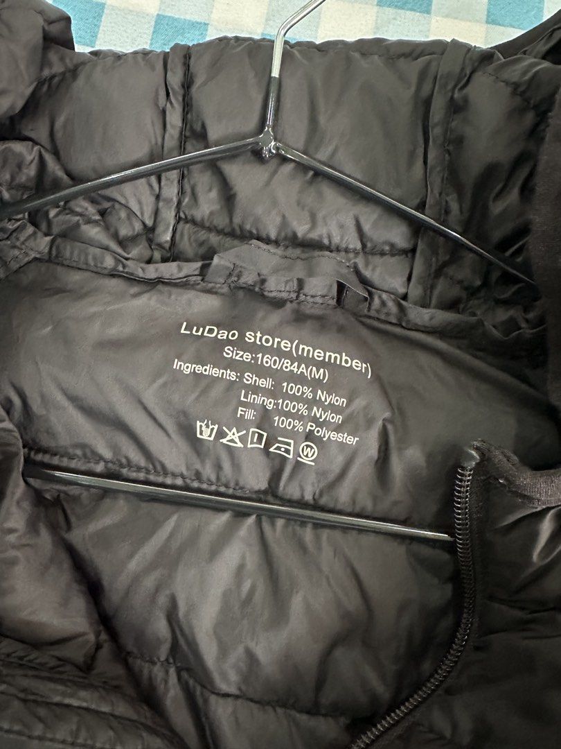 LuDao Store Black Hooded Puffer Jacket - Size M (Category: Coats, Jackets and Outerwear) located in Tarlac. Submitted by melabagan (Listing ID 1455338880, Image 3). Description: - Brand: LuDao Store - Color: Black - Style: Hooded Puffer Jacket - Size: M - Material: 100% Nylon (Shell & Lining), 100% Polyester (Fill) - Features: Lightweight, warm, easy to pack and carry - Ideal for: Layering, cooler weather.