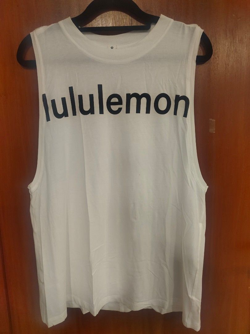 Lululemon White Sleeveless Tank Top Size 4 (Category: Activewear) located in Muntinlupa City. Submitted by cezzy82 (Listing ID 1455383879, Image 1). Description: - White Lululemon tank top - Sleeveless design - Lululemon logo on front - Size 4 - Comfortable and breathable material - Ideal for workouts or casual wear.