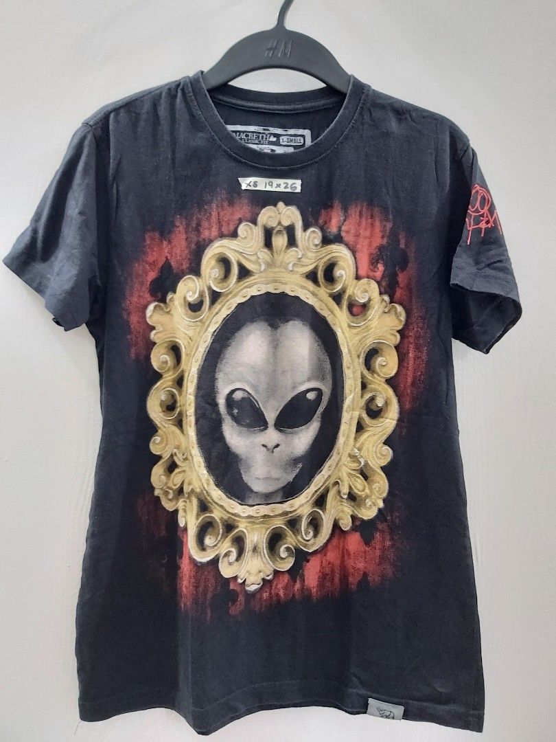 Macbeth Tom D Alien Tee (Category: Tshirts & Polo Shirts ) located in Mandaluyong City. Submitted by fun_demonium (Listing ID 1455469086, Image 1). Description: About: - Brand: Macbeth - XS (19 x 26 inches) - No issues - Personally owned / Not thrifted. - RFS: Decluttering Payment: - Gcash / Maya / Maribank Shipment: (c/o buyer) - Lalamove / Gogoexpress / J&T.