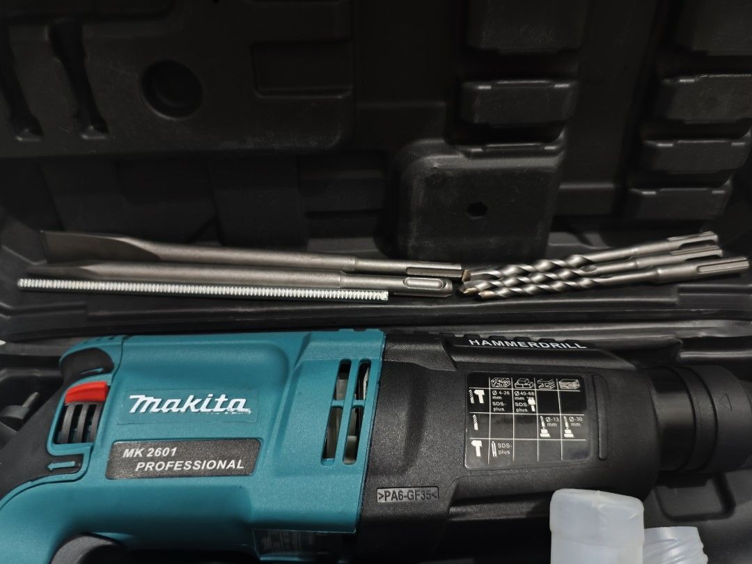Makita Rotary Hammer Drill/Jackhammer (Category: Construction Tools & Equipment) located in Quezon City. Submitted by mktoolsenterprise (Listing ID 1455437945, Image 3). Description: All items are Brand New ‼️ FB PAGE: ‼️MK TOOLS ENTERPRISE ‼️ 📍Batasan Hills Quezon City📍 - Package Includes: ✅Rotary Hammer ✅Accessorues ✅Drill Bits ✅Manual ✅Hard case ✅Handle - Professional Makita 2601 Rotary Hammer Drill - Complete set with drill bits and chisels