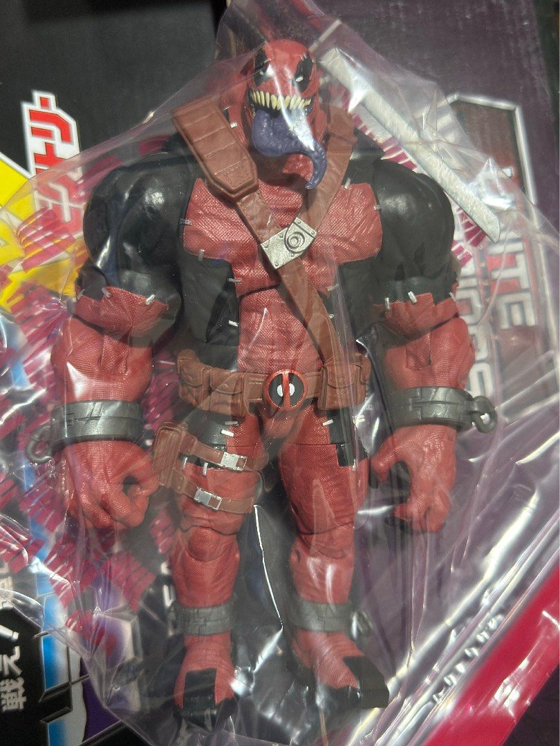 Marvel Legends BAF Venompool Action Figure (Category: Figurines & Statues) located in Marilao. Submitted by rjfrancisco23 (Listing ID 1455363242, Image 2). Description: - Marvel Legends Deadpool action figure - Iconic red and black suit with brown straps - Features his signature tongue-sticking-out expression - Comes in a protective plastic bag - A must-have for any Marvel fan's collection BAF Venompool Loose Authentic Custom Painted Nails .
