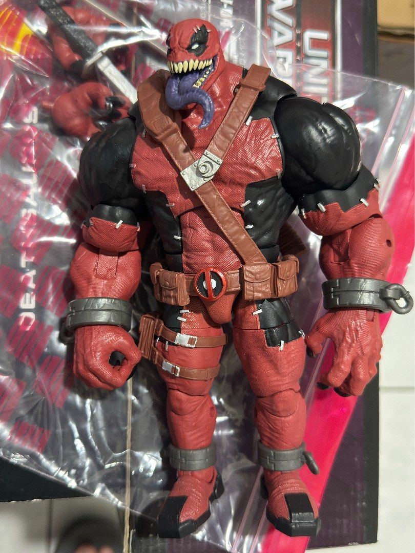 Marvel Legends BAF Venompool Action Figure (Category: Figurines & Statues) located in Marilao. Submitted by rjfrancisco23 (Listing ID 1455363242, Image 1). Description: - Marvel Legends Deadpool action figure - Iconic red and black suit with brown straps - Features his signature tongue-sticking-out expression - Comes in a protective plastic bag - A must-have for any Marvel fan's collection BAF Venompool Loose Authentic Custom Painted Nails .