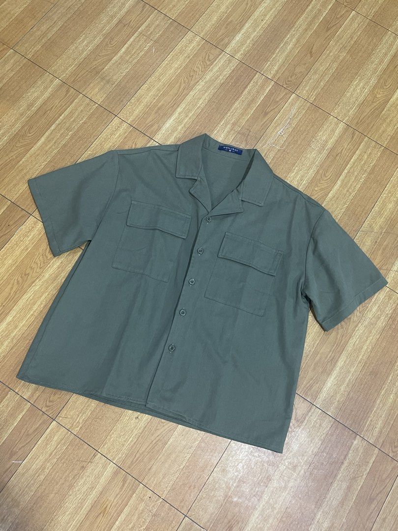 Army Green Button down Boxy Shirt (Category: Formal Shirts) located in Paranaque City. Submitted by lovenclutter (Listing ID 1455355363, Image 2). Description: - Bago lang, No tag na - Size M for Men’s wear - Great quality, uniqlo quality siya - no flaws.
