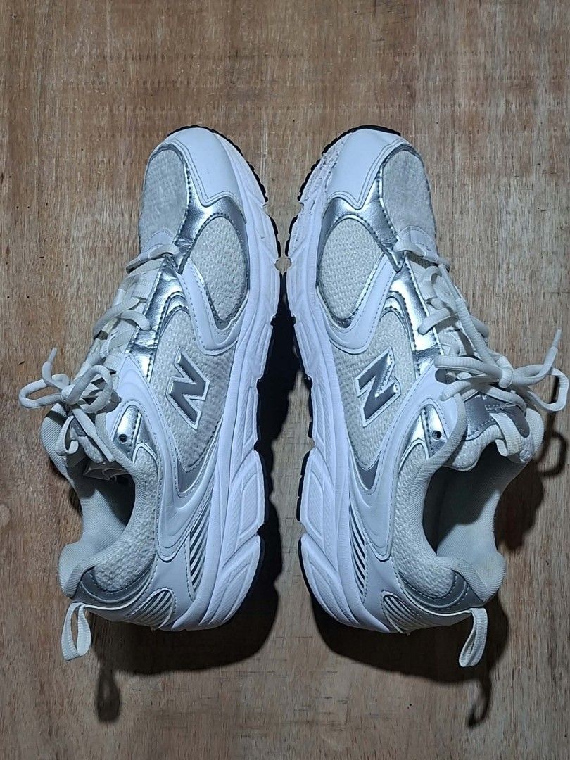 New Balance 408 White Silver Sneakers (Category: Sneakers) located in Manila. Submitted by whoz_jayz (Listing ID 1455330289, Image 3). Description: - Brand new White and Silver New Balance 408 sneakers. - Mesh and synthetic upper with lace-up closure. - Ideal for everyday wear or light workouts. - Offers comfort and style..