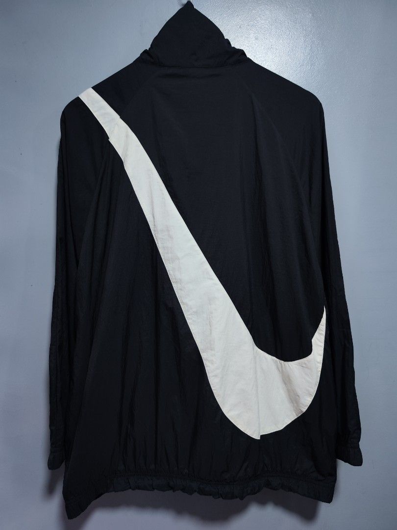 Nike NSW Woven Big Swoosh Jacket (Category: Coats, Jackets and Outerwear) located in Bulacan. Submitted by emilj23 (Listing ID 1455418443, Image 3). Description: Nike NSW Woven Big Swoosh Jacket Size M on tag L 28 W 24 Condition 9.5/10 Color rate 9.5/10 Issue Minimal Stains.