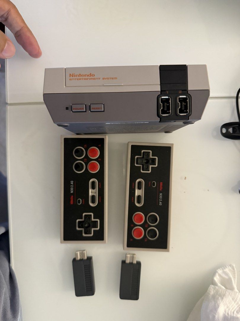 Nintendo Entertainment System NES Classic Edition with Controllers (Category: Nintendo) located in Pasig City. Submitted by rajesh.rajesh (Listing ID 1455336514, Image 1). Description: - Nintendo Entertainment System (NES) Classic Edition console - Includes 2wireless controllers and its adapters brand 8bitdo ( bought it for 3000 ) - Comes with 2 wireless for controllers - Perfect for retro gaming enthusiasts - All items in good working condition 