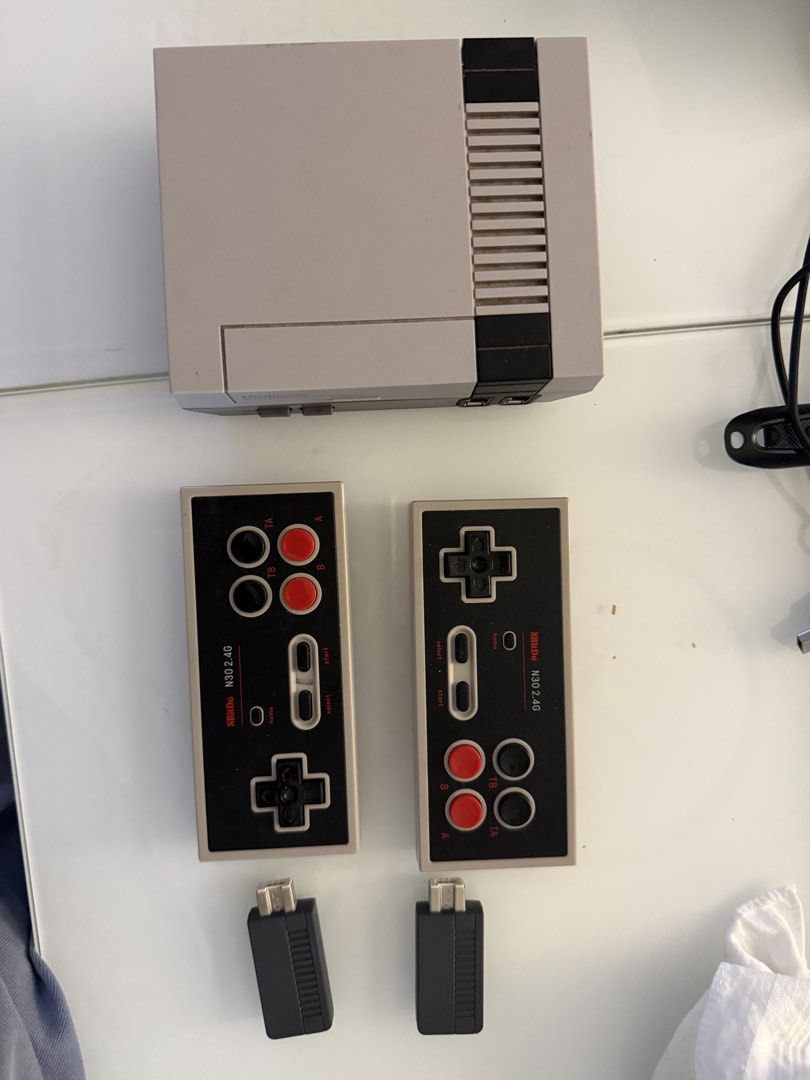 Nintendo Entertainment System NES Classic Edition with Controllers (Category: Nintendo) located in Pasig City. Submitted by rajesh.rajesh (Listing ID 1455336514, Image 2). Description: - Nintendo Entertainment System (NES) Classic Edition console - Includes 2wireless controllers and its adapters brand 8bitdo ( bought it for 3000 ) - Comes with 2 wireless for controllers - Perfect for retro gaming enthusiasts - All items in good working condition 