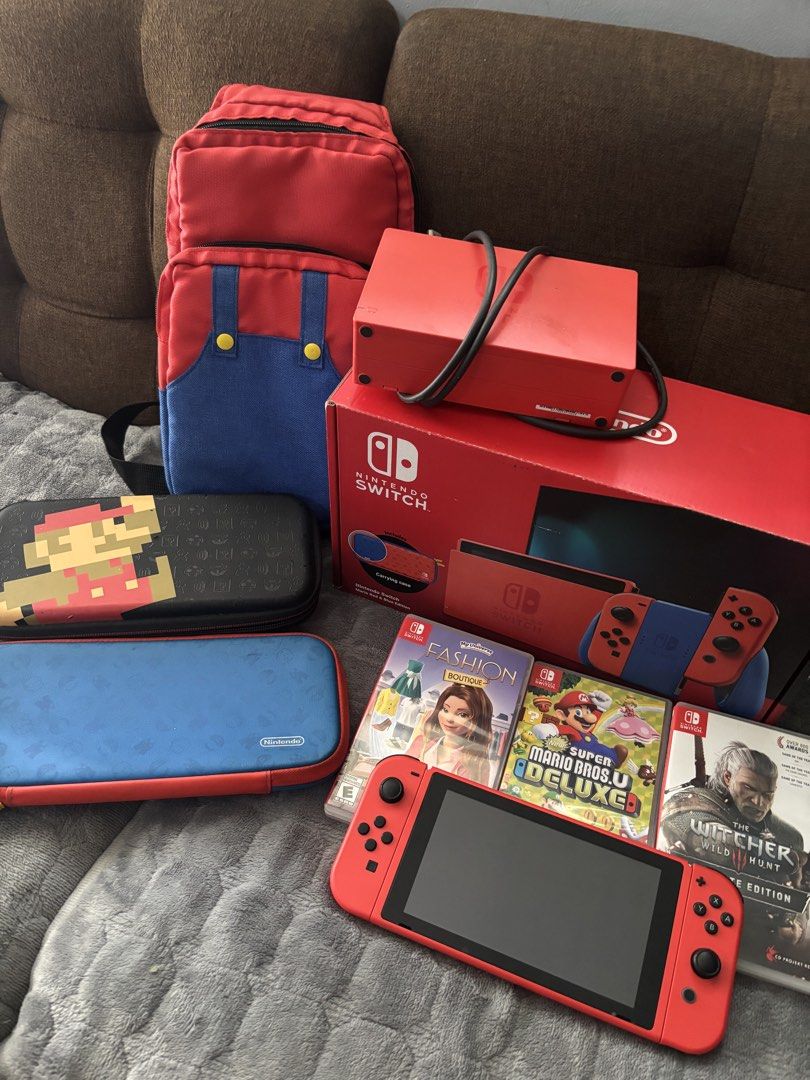 Nintendo Switch Console Mario Edition (Category: Nintendo) located in Rizal. Submitted by gelatinxxx (Listing ID 1455365501, Image 2). Description: Nintendo Switch Console Mario Edition - All original accessories and box included - with mario bag - 2 carrying case - good as new, no issue - with 3 games INCLUDED Super Mario Bros Deluxe (₱2,995) The Witcher Wild Hunt Complete Edition (₱1,595) Fashion Boutique (₱1,895) rfs: hindi na nagagamit negoti