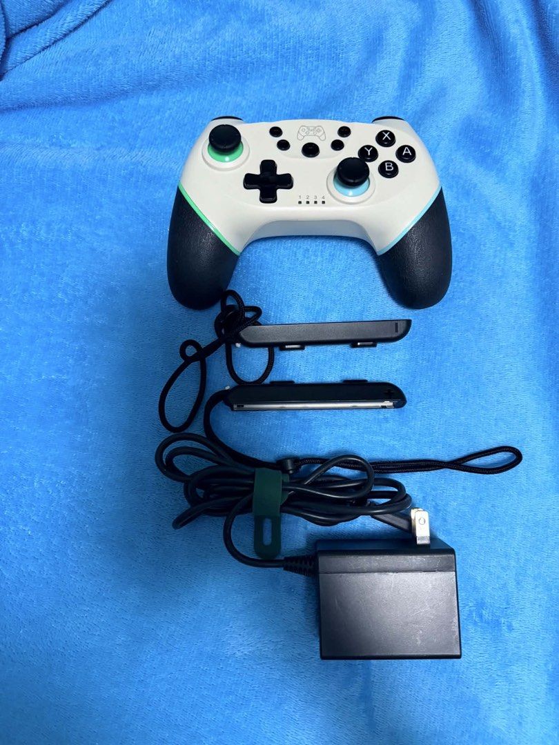 Nintendo Switch Console with Games and Accessories (Category: Nintendo) located in Pasig City. Submitted by wisefish_418f1d (Listing ID 1455341589, Image 3). Description: Nintendo Switch V2 (BUNDLE) inclusion: orig charger Dock Protective case Protective pouch wireless controller Sandisk memory 512gb & 128gb Games: World War Z Rabbids Party Everybody switch Sifu Red Redemption Overcooked It takes two Mario Odyssey And other Digital Games Price 21