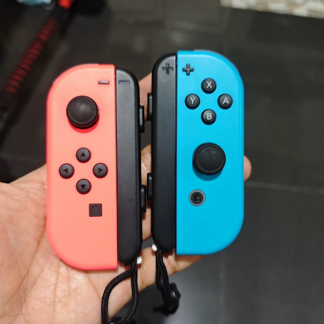 Nintendo Switch Joycon Neon Blue and Red Original (Category: Controllers) located in Quezon City. Submitted by shopme_gadget30 (Listing ID 1455480664, Image 1). Description: kindly read the details first for sale fixed price mint Condition tested and working no drifting all buttons working compatible to Nintendo switch v1/v2/ or oled original neon blue and neon red with strap Shoopppppeee —,✅ can check out pm for the linnnkkk (If shoopppee check 